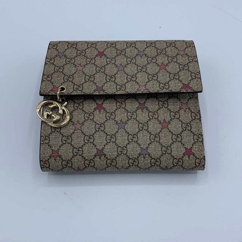 Authentic Gucci trifold wallet with coin pouch. 4.25” x 4”